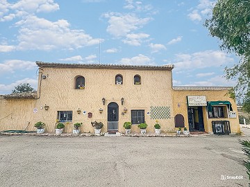 Beautiful rustic home with pool and bar in Los Gabrieles
